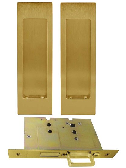 Premium Dummy Pocket-Door Mortise Lock Set with Rectangular Pulls in Aged Brass.